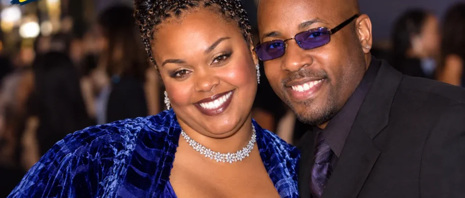 Lyzel Williams and Jill Scott smiling together at a public event.