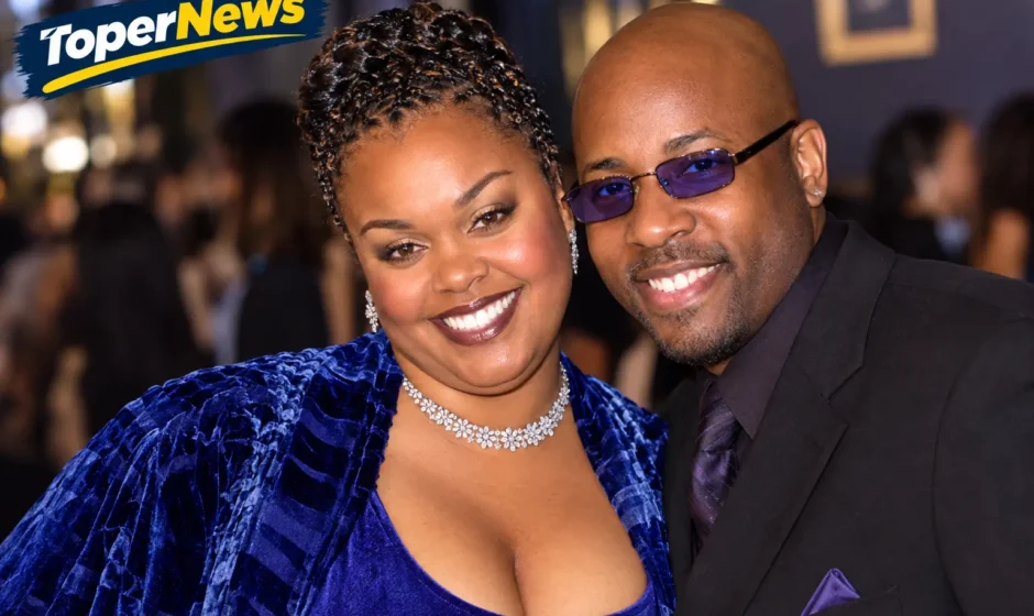 Lyzel Williams and Jill Scott smiling together at a public event.